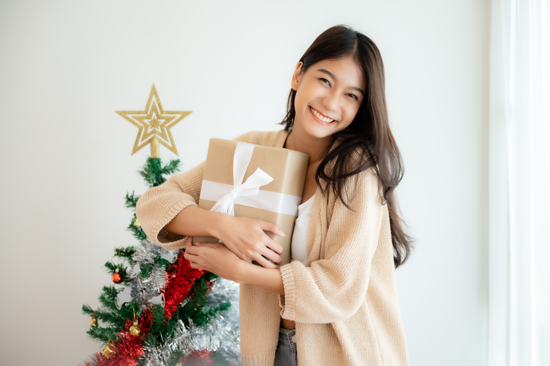 Young asian woman happy and smile while opening gift box. Happy